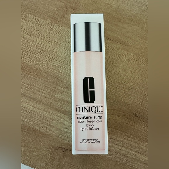 Clinique Other - Clinique Moisture Surge Hydra-Infused
Lotion 200ml/6.7oz All Skin
